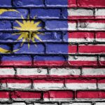 Vlajka Malajsie je inspirována vlajkou USA a má i podobnou symboliku
